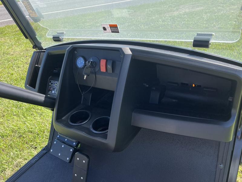 Driver’s console and dashboard of 2024 Cushman Hauler 1200 EFI Gas at Oakmont Country Club.