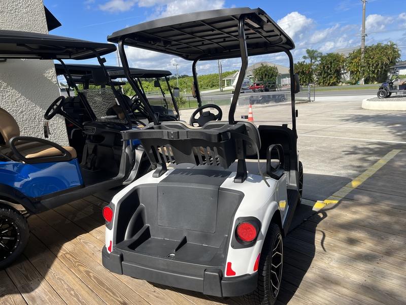 Seats and interior of 2024 E-Z-GO Freedom RXV ELiTE Lithium Bright White in Charlotte North Carolina