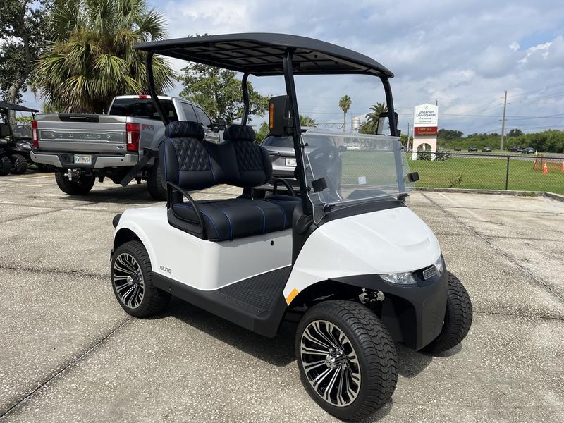 Side profile of 2024 E-Z-GO Freedom RXV ELiTE Lithium Bright White in Houston Texas