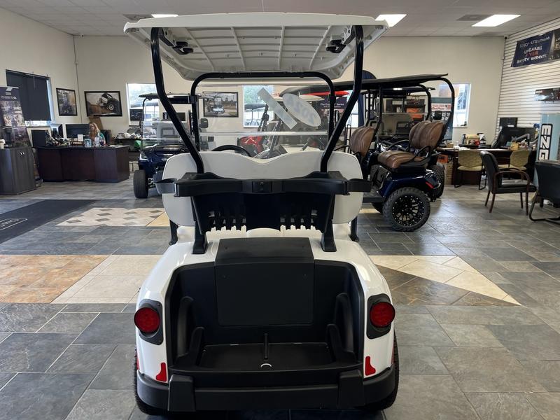 Wheels and suspension of 2024 E-Z-GO Freedom RXV ELiTE Lithium Bright White in Los Angeles California