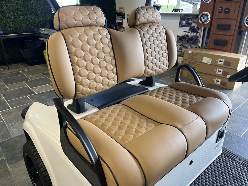 Comfortable seats of 2024 E-Z-GO Freedom RXV ELiTE Lithium Bright White in Orlando Florida