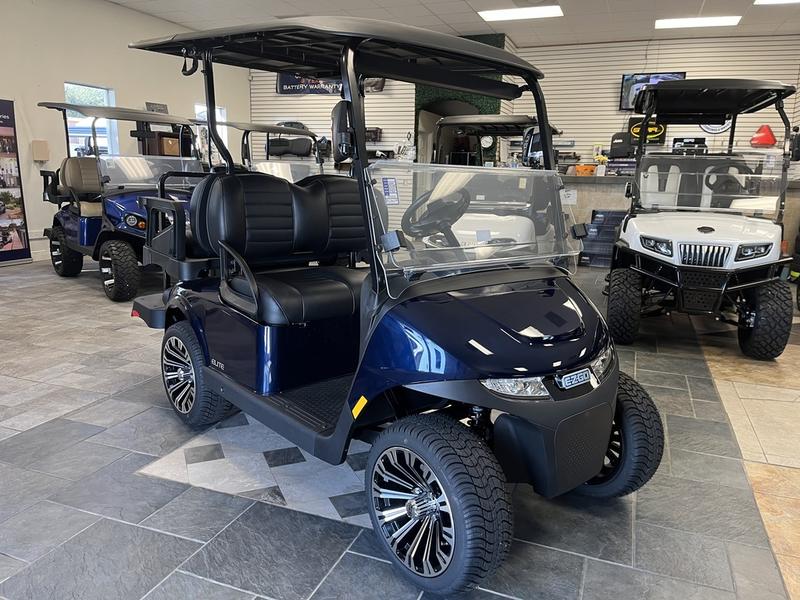 Side profile of 2024 E-Z-GO Freedom RXV ELiTE Lithium Patriot Blue in Detroit Michigan