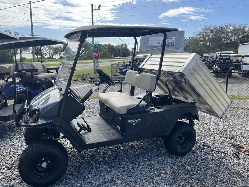 Front view of the 2025 Cushman Hauler 1200X Gas parked at Grey Oaks Country Club in Naples, Florida.