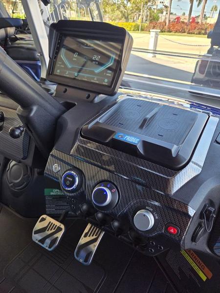 LED lighting and wheels of 2025 Evolution D-Max GT4 Blue golf cart available in Illinois with export and nationwide delivery
