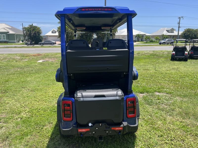 LED lighting and premium wheels of 2025 Evolution D-Max GT4 golf cart available in Tennessee with export and nationwide delivery