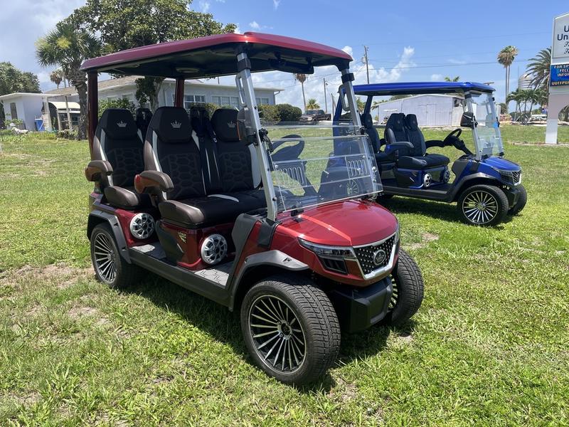 Front view of 2025 Evolution D-Max GT4 Red golf cart available in Virginia with nationwide delivery and export options