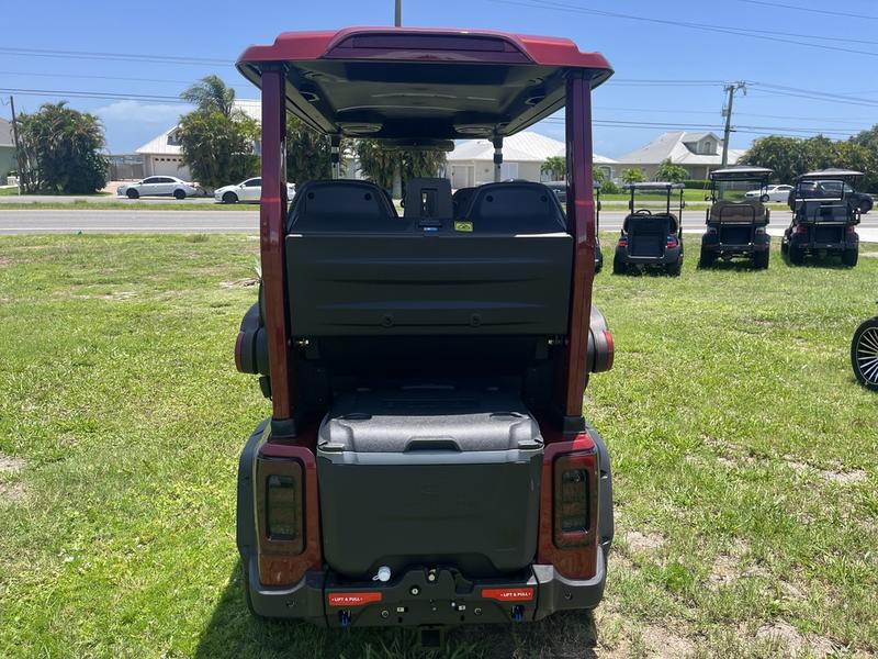 LED lighting and alloy wheels of 2025 Evolution D-Max GT4 Red golf cart available in Virginia with nationwide delivery and export