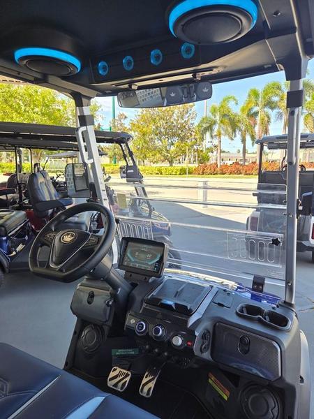 Rear view of 2025 Evolution D-Max GT4 Red golf cart available in California