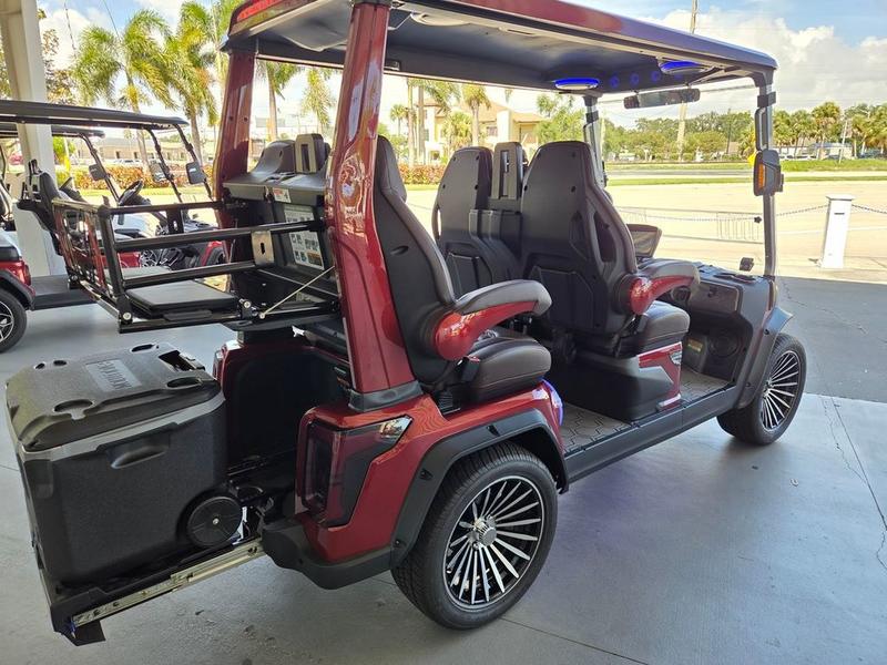 Four-passenger seating of 2025 Evolution D-Max GT4 Red electric golf cart in California
