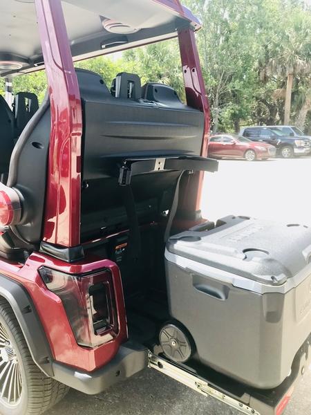 Side profile of 2025 Evolution D-Max GT4 Red electric golf cart in New York with export and nationwide delivery