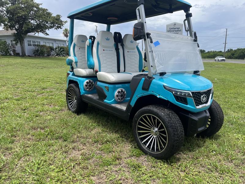 Front view of 2025 Evolution D-Max GT4 Sky Blue electric golf cart with nationwide delivery and export options