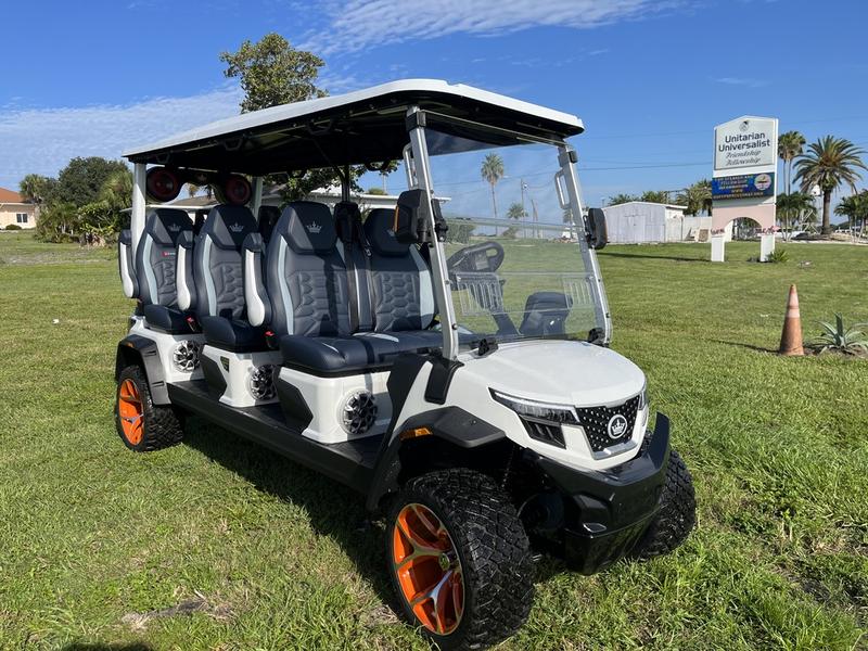 Front view of 2025 Evolution D-Max XT6 white electric golf cart available in Michigan with nationwide delivery and export options