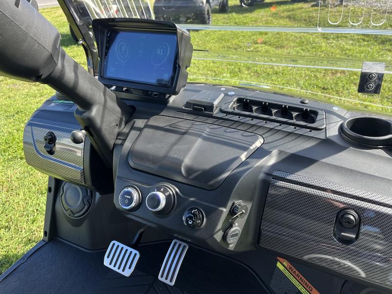 Dashboard interior of 2025 Evolution D5-Maverick 4 Plus black electric golf cart