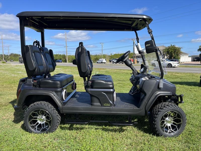Side profile of 2025 Evolution D5-Maverick 4 Plus black four-seater golf cart