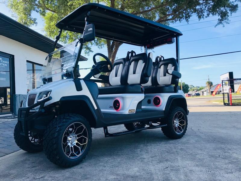 Front angle of 2025 Evolution D5-Maverick 4 Plus white electric golf cart