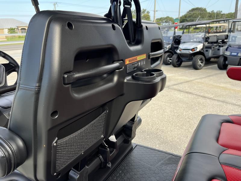 Dashboard interior of 2025 Evolution D5-Maverick 4 red electric golf cart