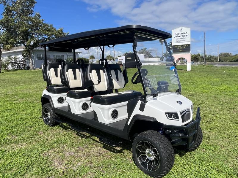 Side profile of 2025 Evolution D5-Maverick 6 Plus Texas White six-passenger golf cart