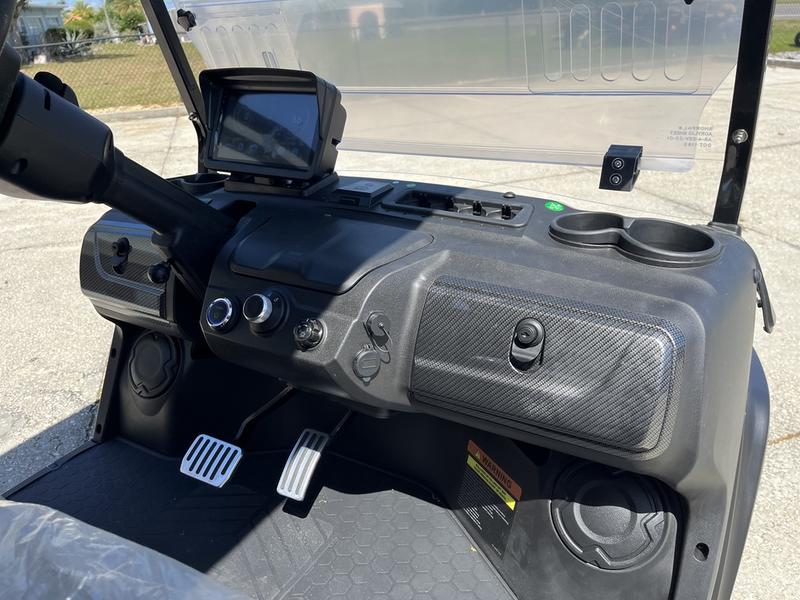 Dashboard interior of 2025 Evolution D5-Ranger 2+2 black golf cart available for Florida and nationwide delivery
