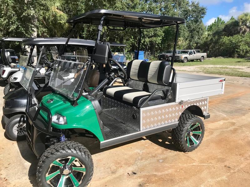 Front view of 2025 Evolution Turfman 800 green utility vehicle available in Illinois with nationwide delivery and export options