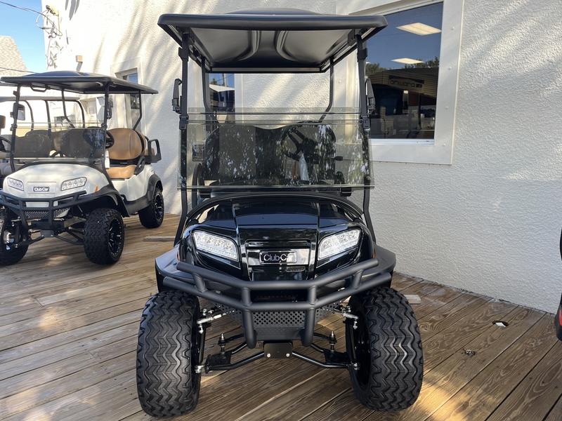 Front LED headlights of 2025 Club Car Onward Lifted 4 Passenger Gas golf cart in Dallas Texas