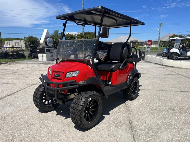 Side view of 2025 Club Car Onward Lifted 4 Passenger Gas golf cart in Orlando Florida