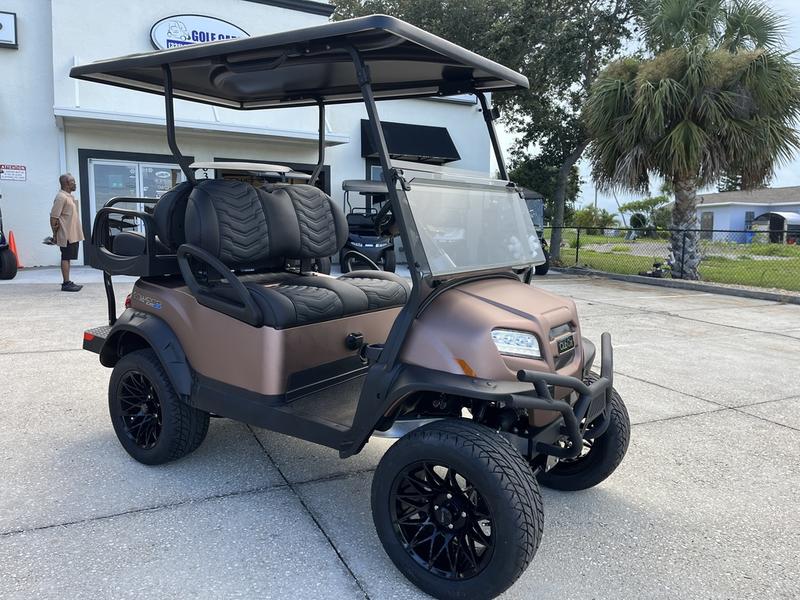 Front view showing LED headlights on 2025 Club Car Onward Lifted 4 Passenger XR Lithium in Austin Texas