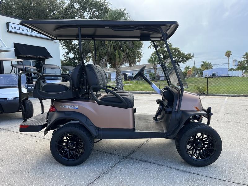 Lifted suspension and all-terrain tires on 2025 Club Car Onward Lifted 4 Passenger XR Lithium in Austin Texas