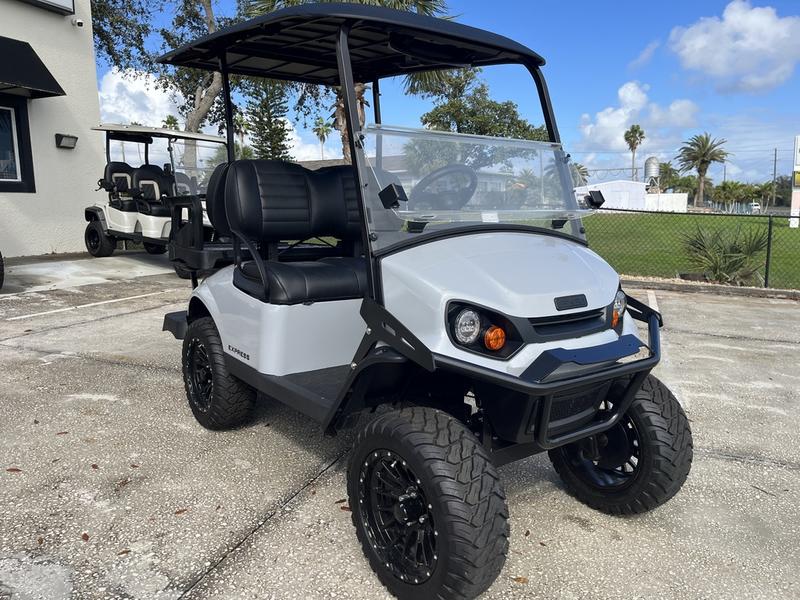 Side view of 2025 E-Z-GO Express 4 Gas Stardust in Miami Florida