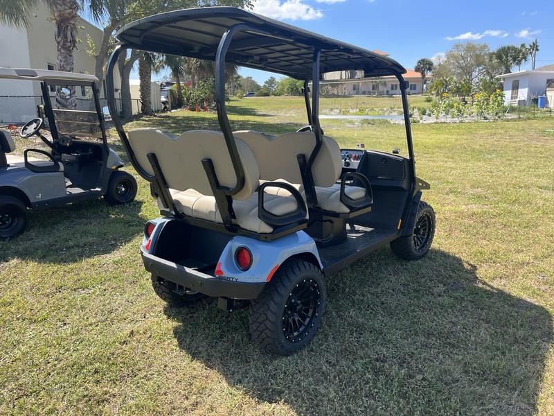 Alloy wheels and suspension of 2025 E-Z-GO Liberty ELiTE Lithium Ocean Grey in Dallas Texas