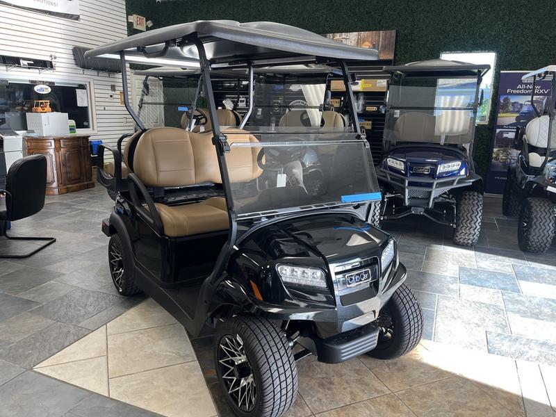 Side profile of 2026 Club Car Onward 4 Passenger XR Lithium golf cart with lifted stance
