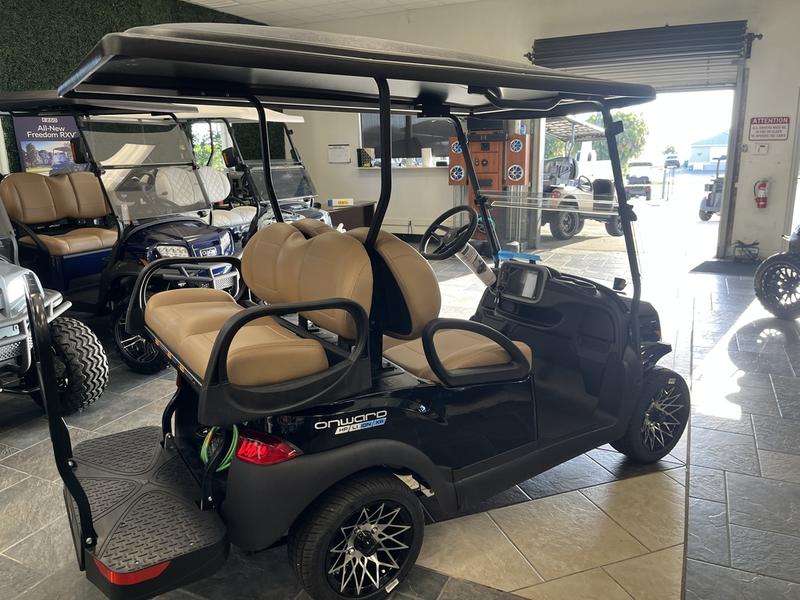Rear fold-down seat and cargo platform on the 2026 Club Car Onward 4 Passenger XR Lithium