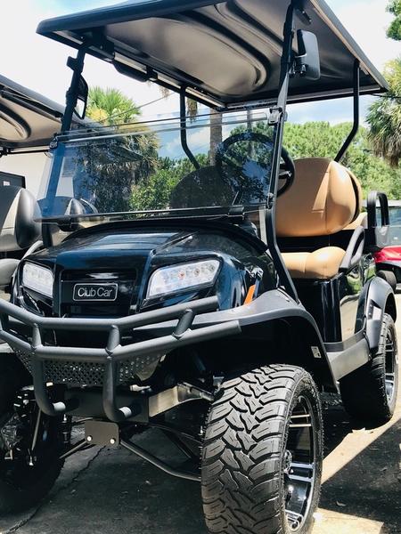 Black 2026 Club Car Onward Lifted 4 Passenger Gas golf cart side view available in Florida with nationwide delivery