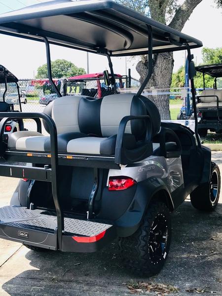 Dashboard controls and steering area on 2026 Club Car Onward Lifted 4 Passenger Gas