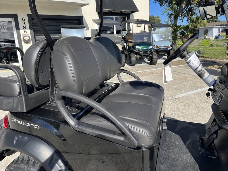 Close-up of the gas engine and power system on 2026 Club Car Onward Lifted 4 Passenger