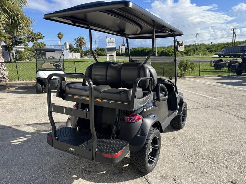 Front view showing LED headlights of the 2026 Club Car Onward Lifted 4 Passenger Gas cart
