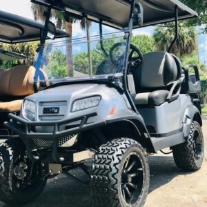Side view of 2026 Club Car Onward Lifted 4 Passenger Gas golf cart in metallic finish