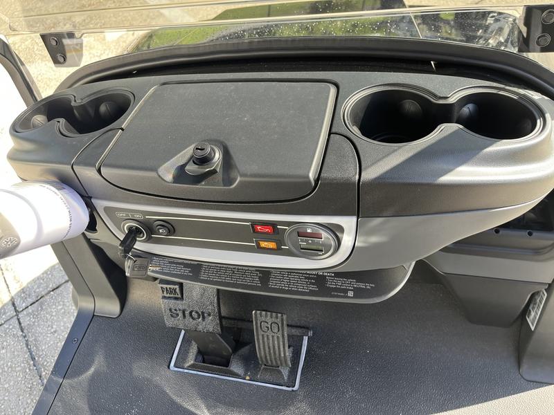 Rear fold-down seat and cargo bed on 2026 Club Car Onward Lifted 4 Passenger Gas