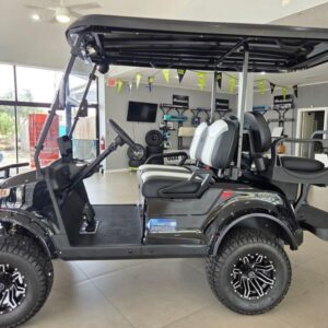 Suspension and all-terrain tires of 2026 Star EV CP-2+2 Lifted in Savannah, Georgia.