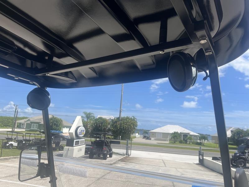 2026 Star EV Capella 2+2 Lifted driving through PGA National Resort in Palm Beach.