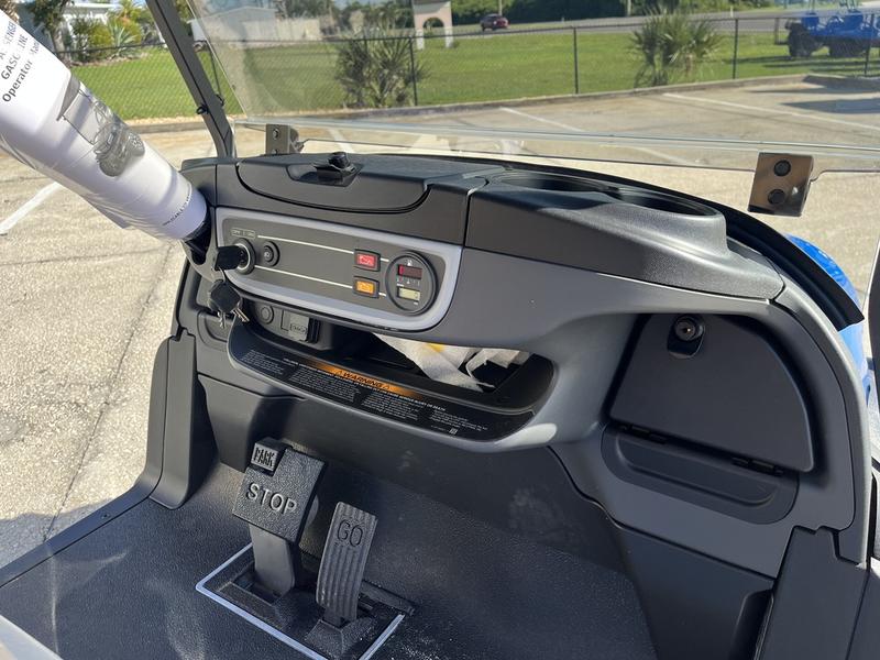 Dashboard and controls of 2026 Club Car Onward Lifted 4 Passenger Gas blue North Carolina