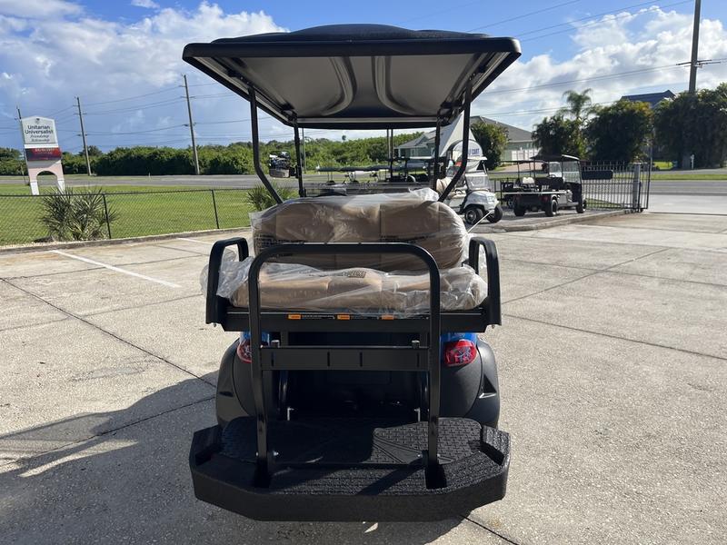 Four-passenger premium seating inside 2026 Club Car Onward Lifted Gas blue North Carolina