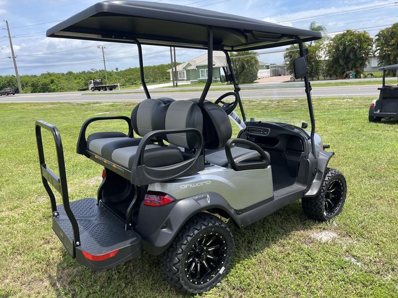 Close-up of gas engine and drivetrain on 2026 Club Car Onward Lifted 4 Passenger Gas golf cart in Florida
