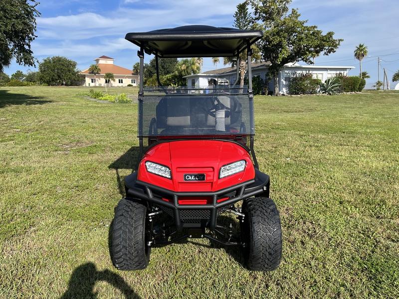 Front LED headlights on 2026 Club Car Onward Lifted 4 Passenger Gas red golf cart in California