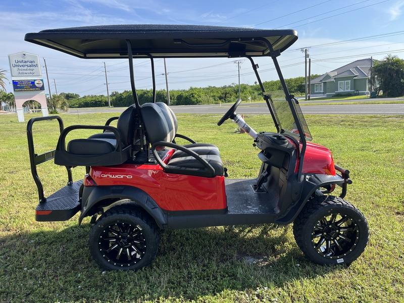 Rear folding seat and cargo platform on 2026 Club Car Onward Lifted Gas red California