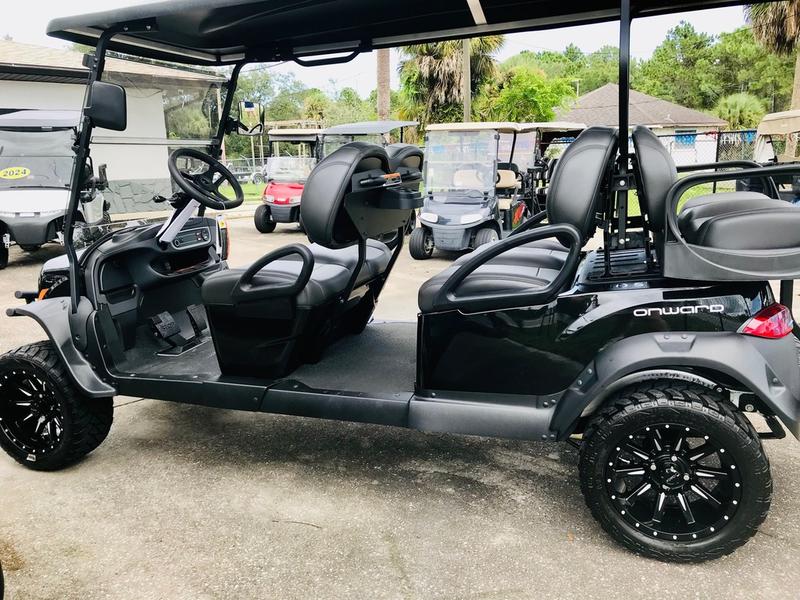 Six-passenger premium seating inside 2026 Club Car Onward Lifted Gas black Ohio