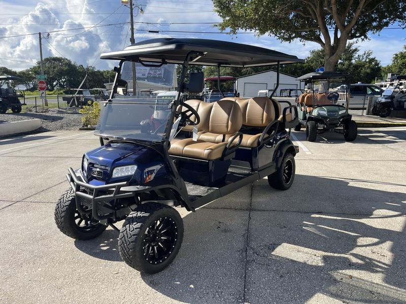 Six-passenger premium seating inside 2026 Club Car Onward Lifted Gas blue Michigan