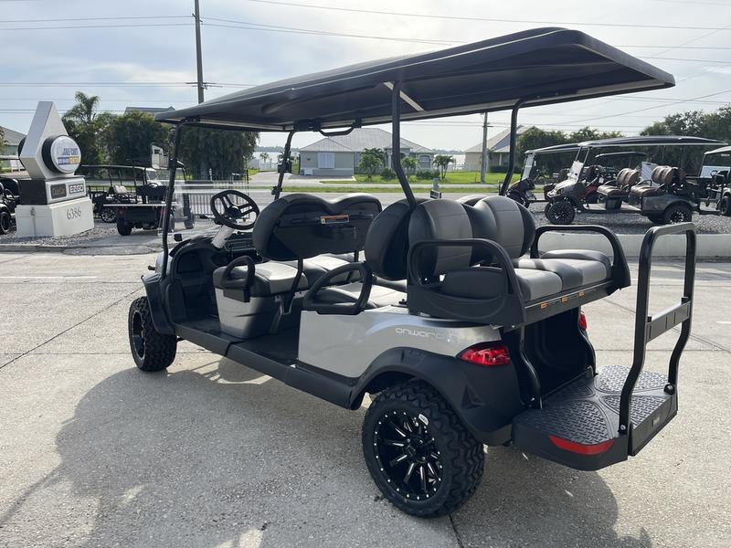 Front view of 2025 Evolution Forester 6 Plus white electric golf cart available in Alabama with nationwide delivery and export options