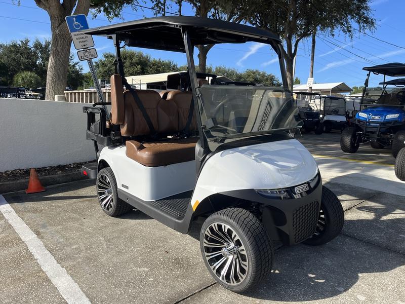 Side view of 2026 E-Z-GO Freedom RXV ELiTE Lithium Bright White in Charleston South Carolina