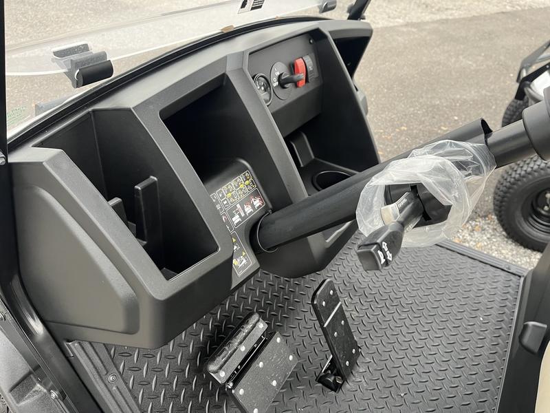 Cushman Hauler 1200X Gas utility vehicle in use at Hilton Head Island golf resort.